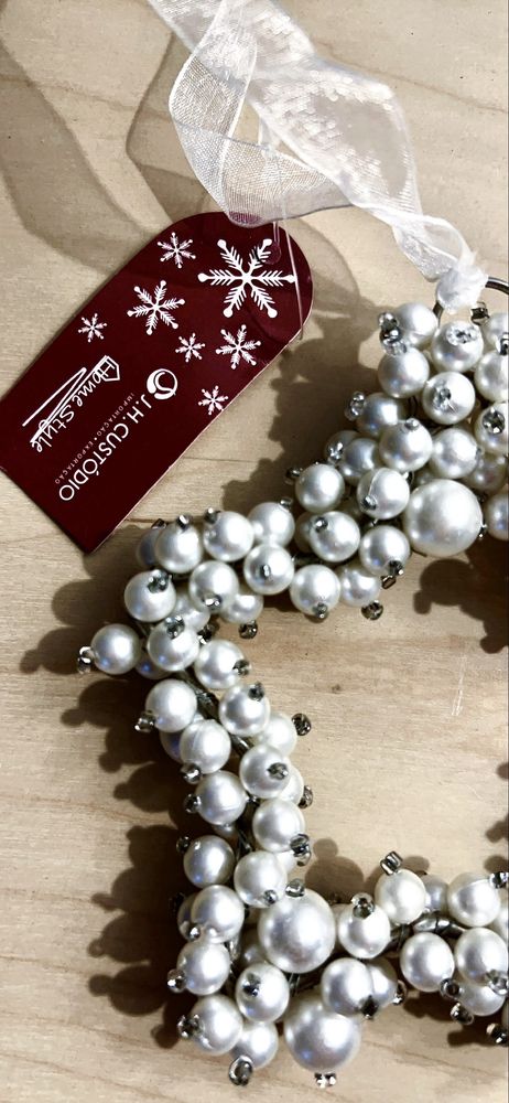 Estrela devirativa de natal em perolas e metal