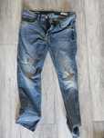 Spodnie jeans męskie