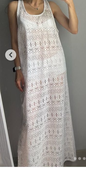 Прозора сукня на пляж.