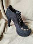 Botim com Tachas