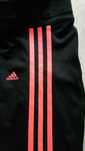 Leginsy jak nowe Adidas 3/4 czarne z pomarańczowymi paskami, r. S