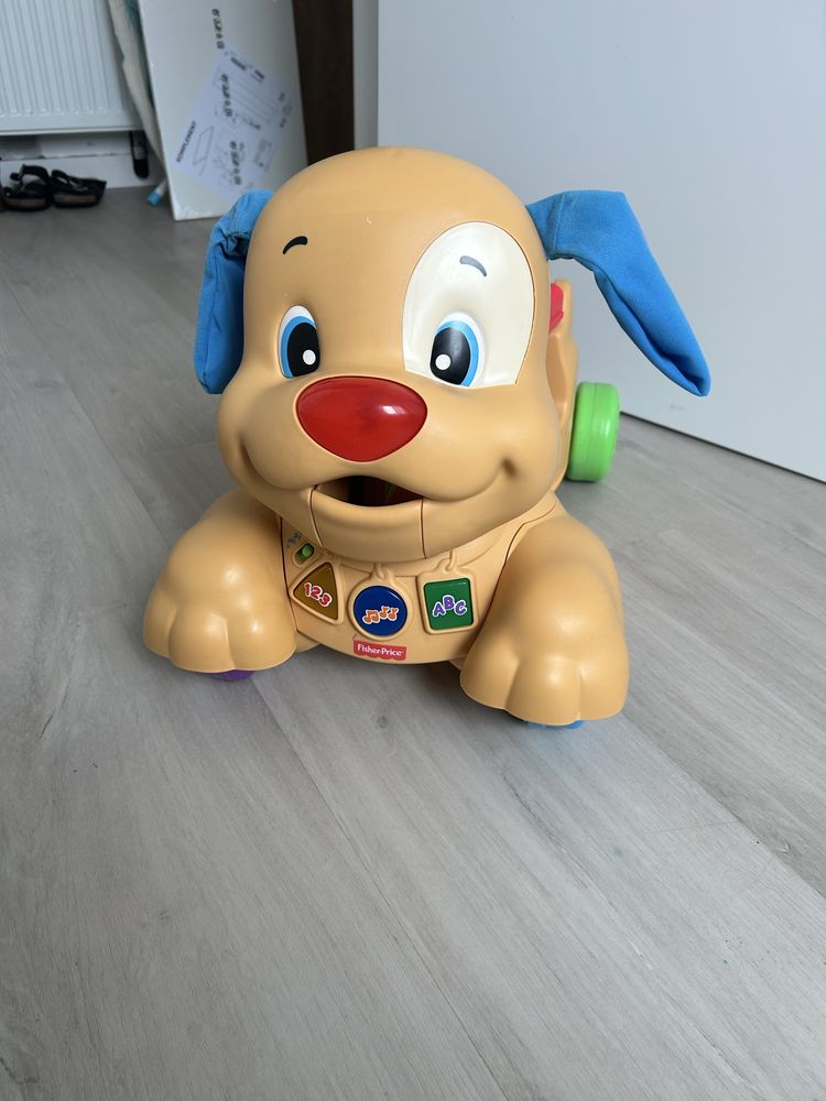 Fisher Price piesek jezdzik
