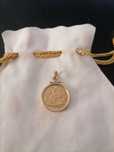 Meia Libra em ouro com 54 gr.