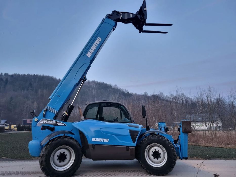 Manitou Ładowarka teleskopowa MT1440 JakNowa 2016r z Norwegii niski przebieg 3121 mtg Oryginał 14 metrów PERKINS SILNIK  Okazja maszyna jak nowa zero zniszczeń luzów i wycieków 3125 mt 2016r