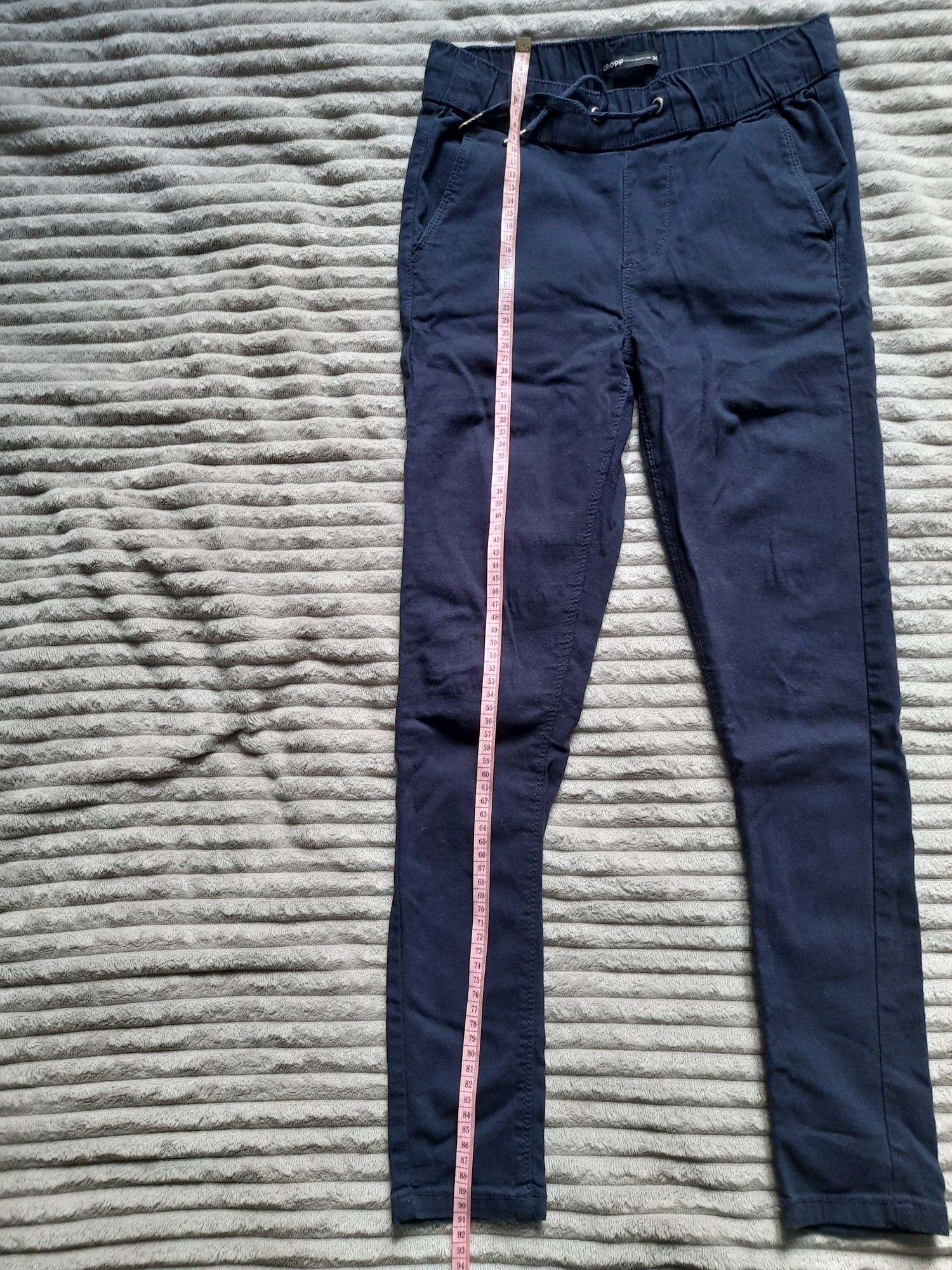 Spodnie materiałowe z kieszonkami z wysokim stanem Cropp XS 34