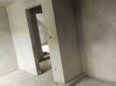 Tynki maszynowe cementowo wapienne