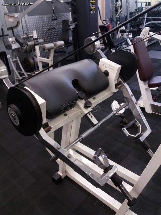 Technogym isotonic biceps silownia obciazenie arm curl