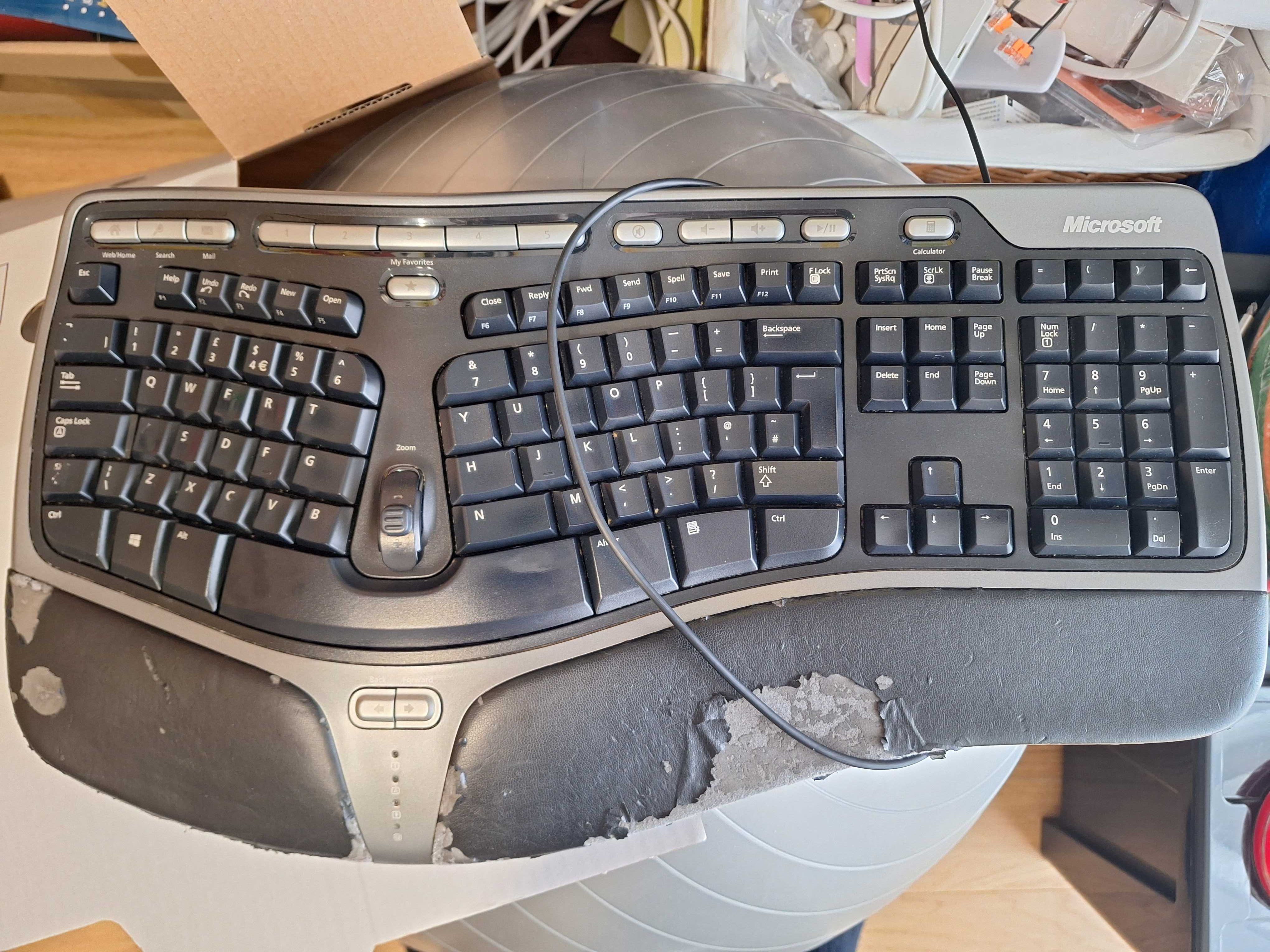 Microsoft Ergonomic Keyboard (uma tecla não funciona)