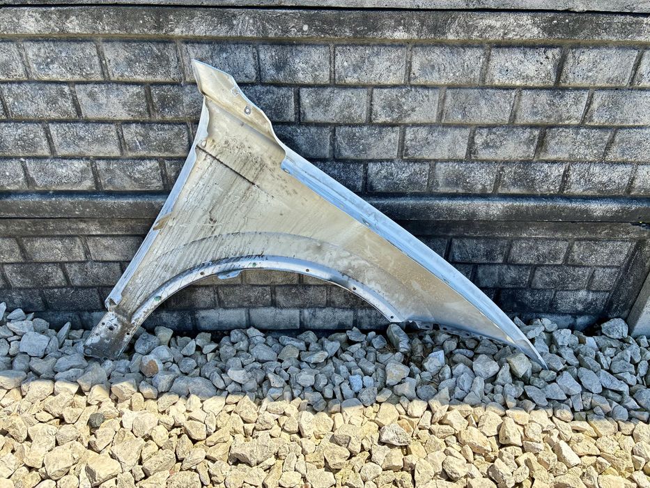 Blotnik przedni lewy LC9A VW Touareg 3 III 760 18- oryginal