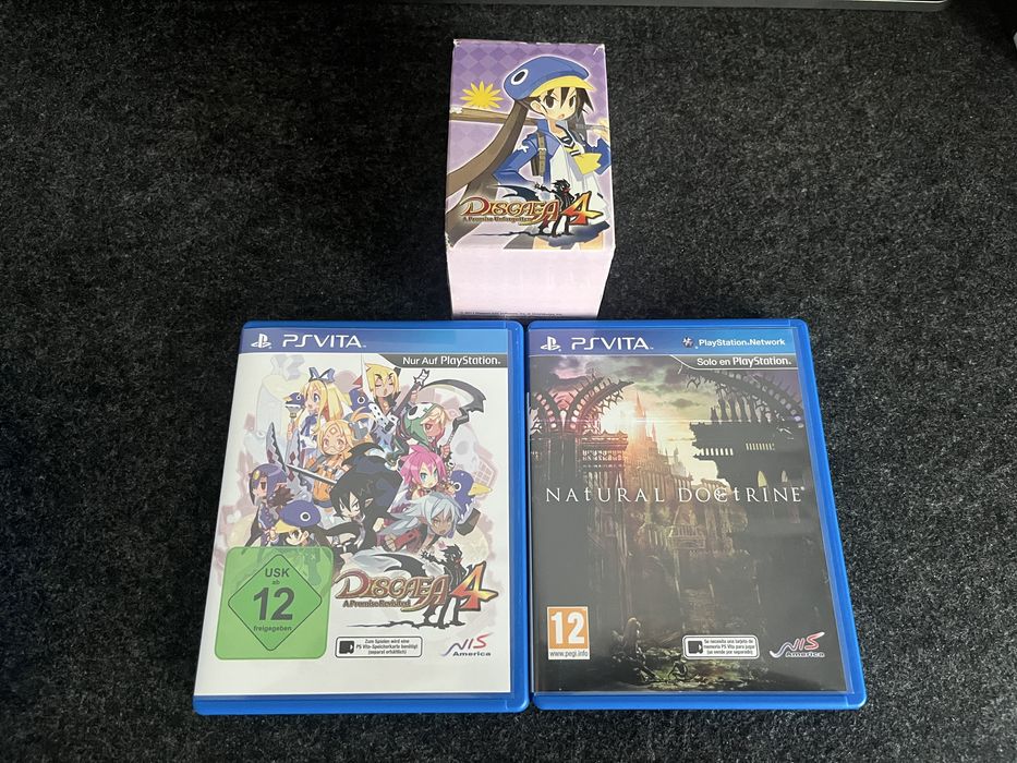 Conjuntos 2 jogos PS Vita + figura