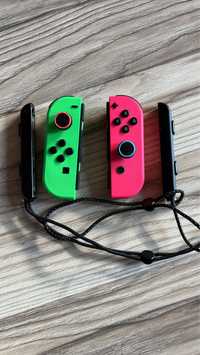 Oryginalne Joy con do Nintendo switch różowy i zielony.