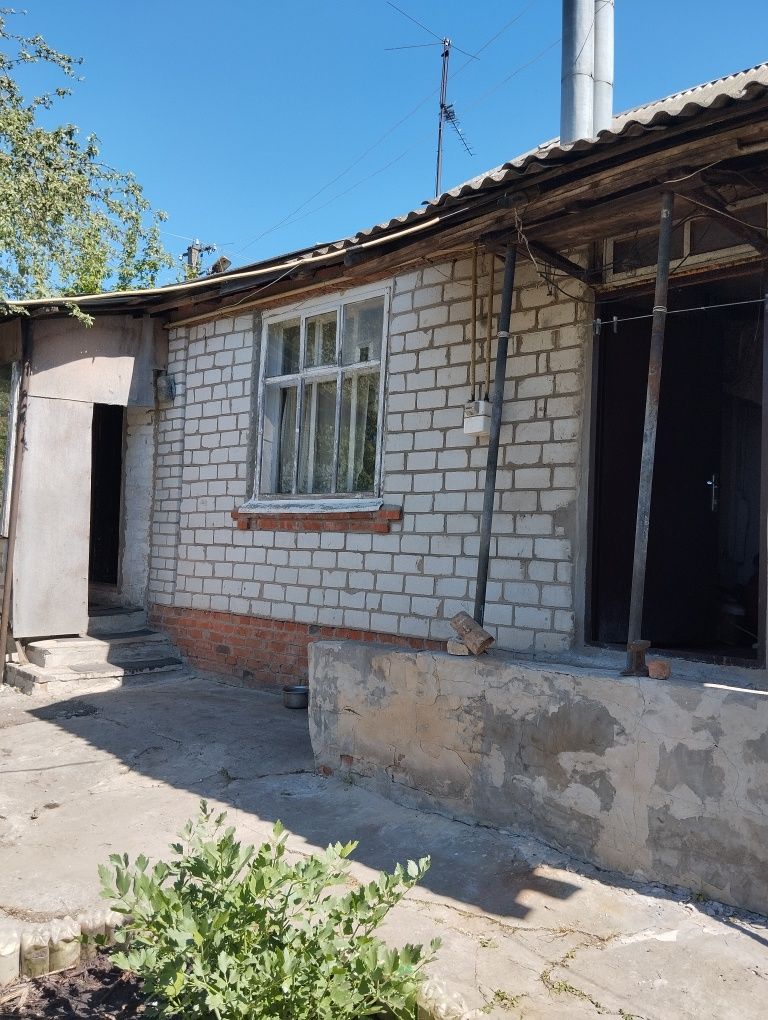Продам  дом на два входа в Нововодолажском районе