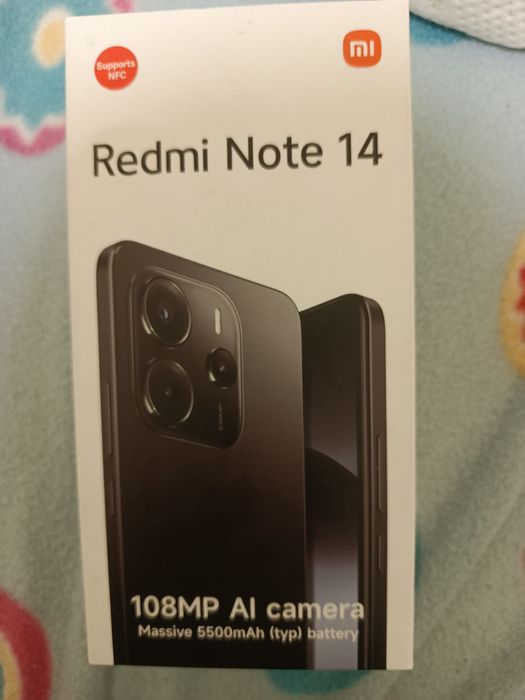 Redmi note 14 mais uns fones de bluetooth