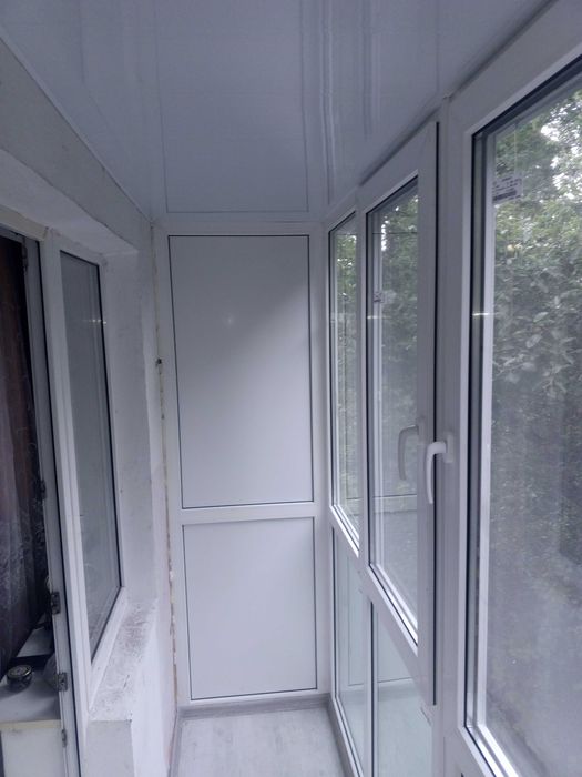 Балкон під ключ. Вікна і двері