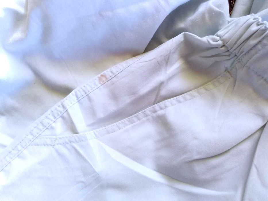 Spodnie damskie rybaczki bladoniebieskie rozm. 50