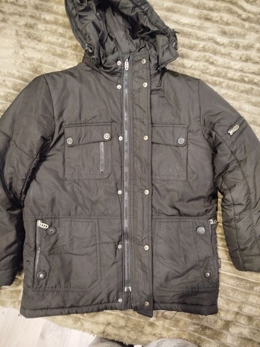 Зимова куртка хлопчик 140 см