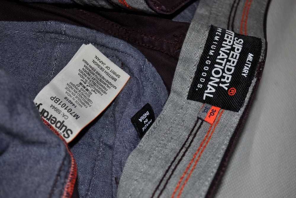 SUPERDRY MILITARY S 82cm 30/30 męskie spodnie jeansowe slim fit s7v