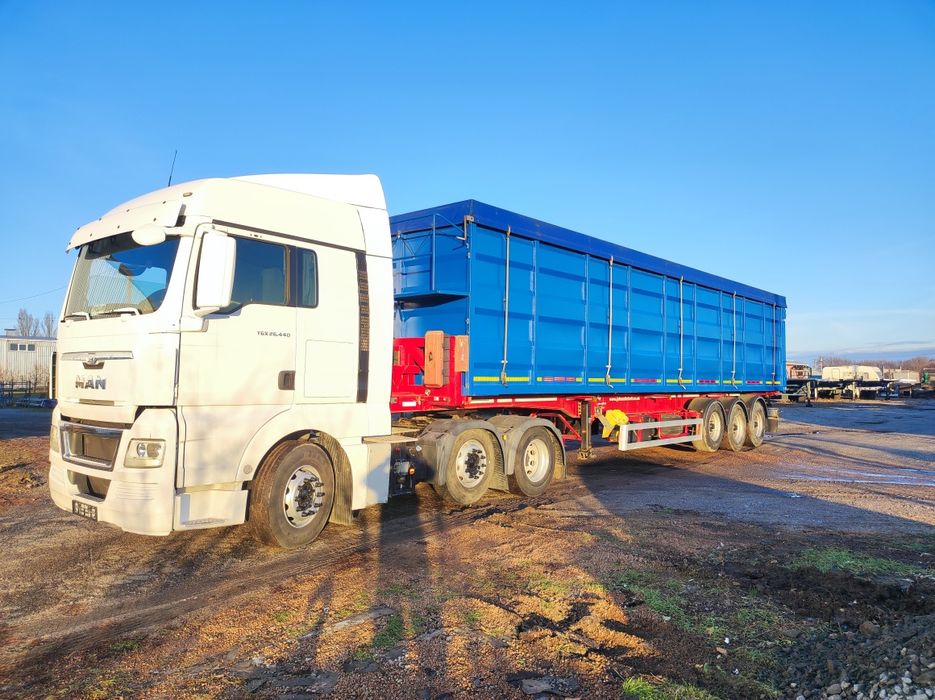 Самоскид контейнеровоз зерновоз заводський полуприцеп 68 кубів