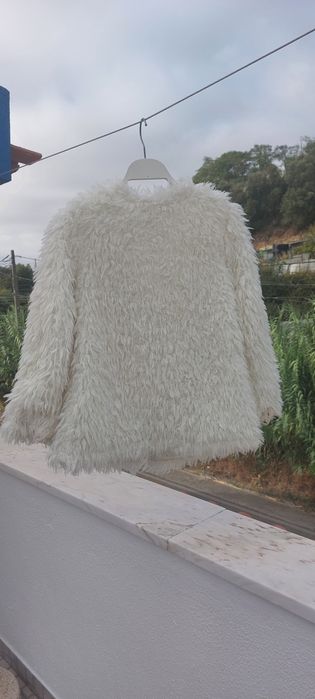 Vende-se um casaco de pêlo