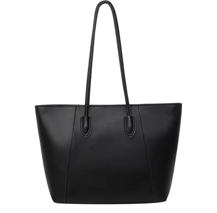 Велика сумка на плече