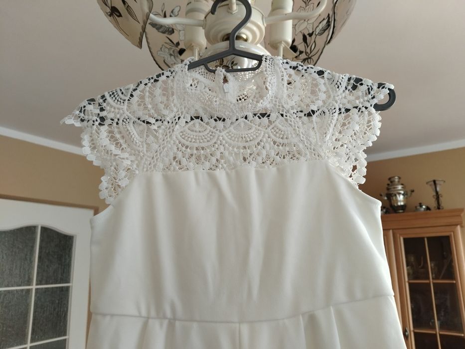 Kombinezon biały 140-146