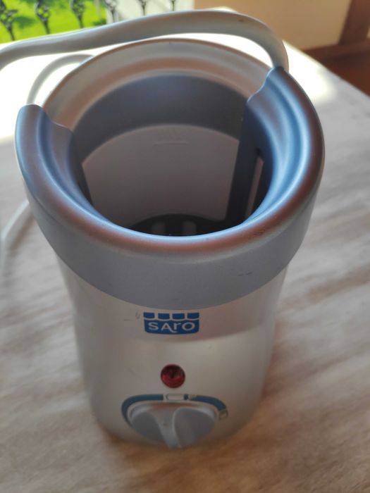 Esquentador de biberões como novo