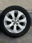 Oryginalne felgi 5x105 16 cali Opel Astra J z oponami zimowymi 205/60