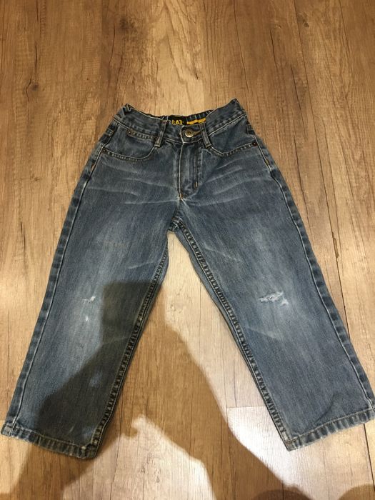 Spodnie jeansowe z dziurami CAT r.  104 cm