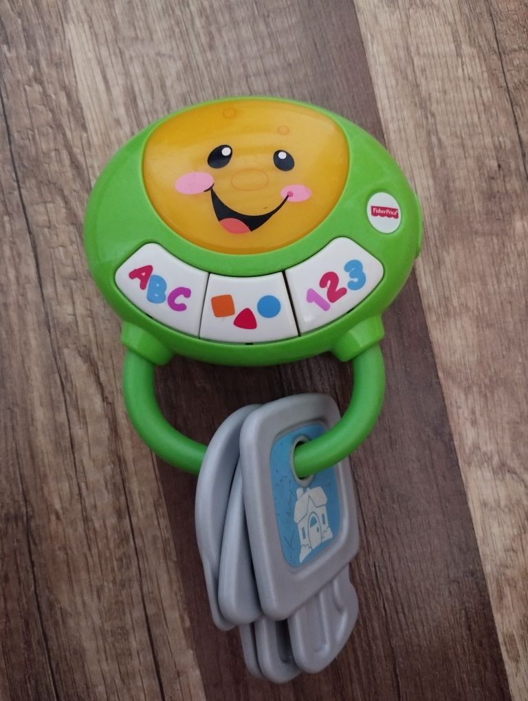 Garnuszek na klocuszek kluczyki Fisher price