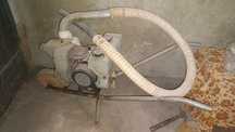 Motor de rega com mangueira