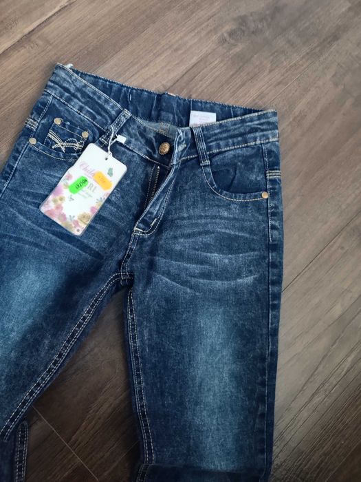 Spodnie jeansowe dla dziewczynki w rozmiarze 146 nowe