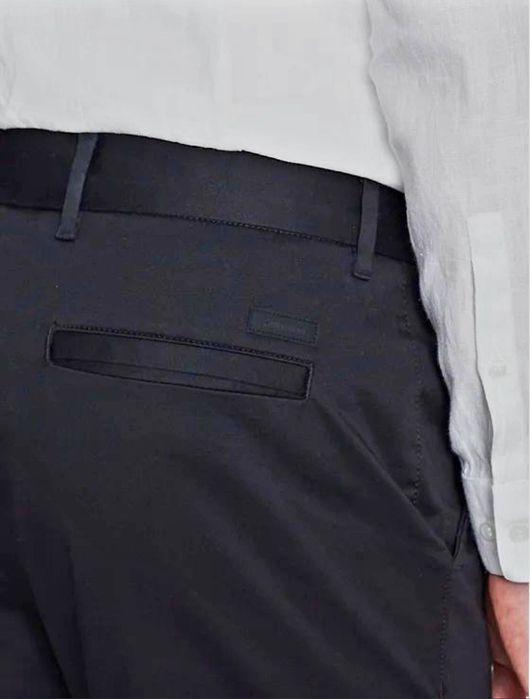 Чіноси брюки Calvin Klein Slim Fit.