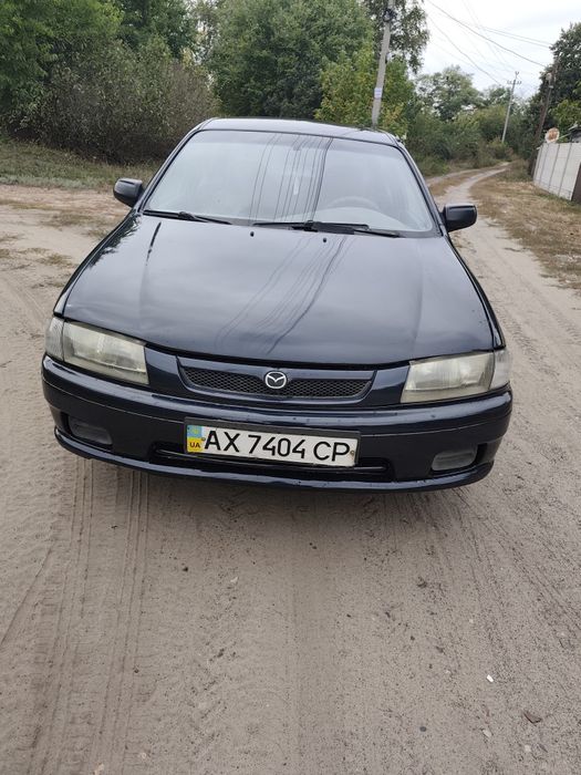 Mazda 323 1998 год