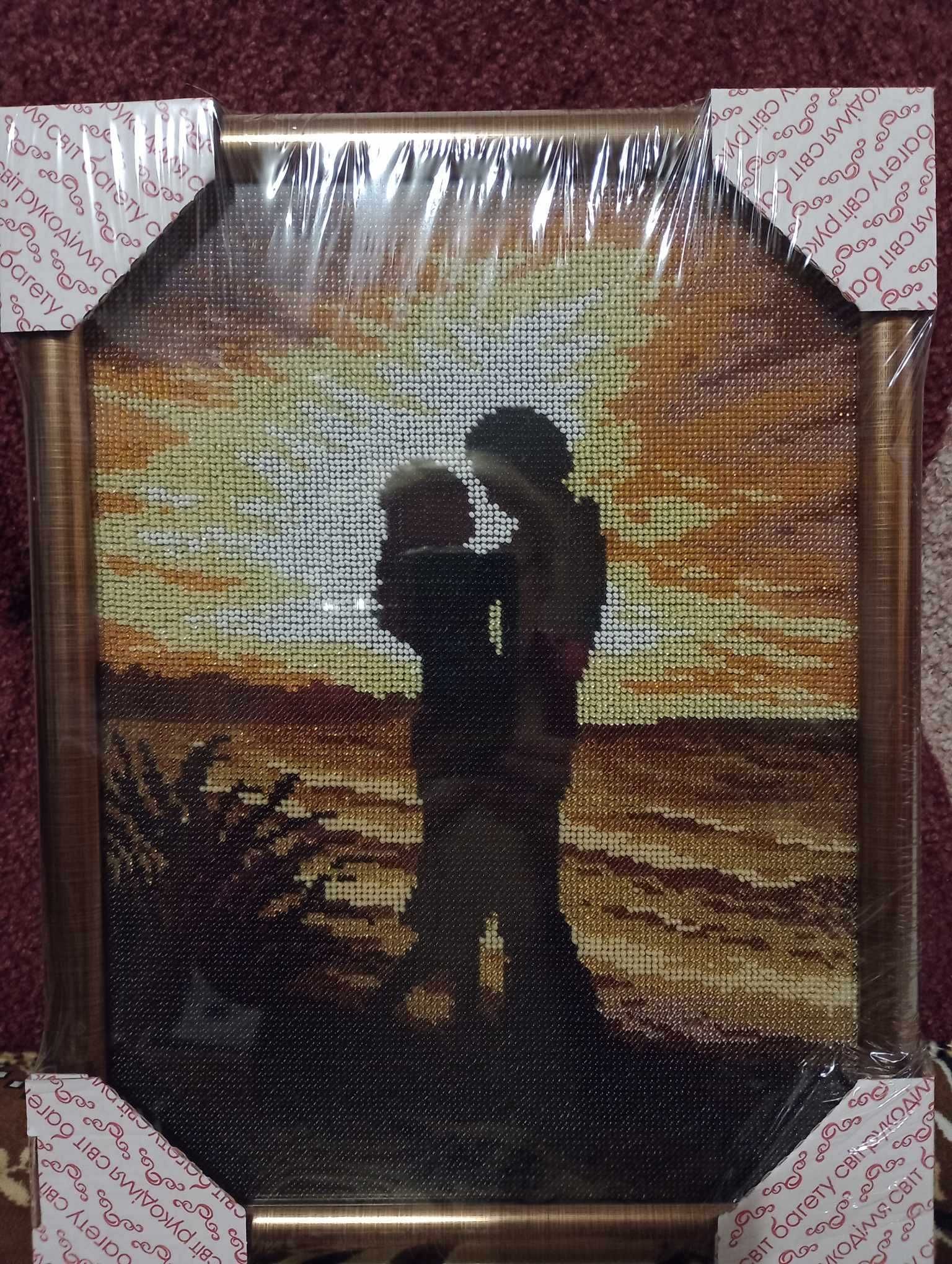 Картина вышитая бисером в рамке"Встреча влюбленных на закате"