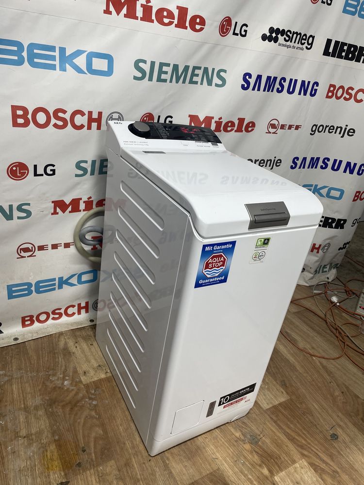 Пральна машина AEG 7000 series вертикальне завантаження (стиральная)