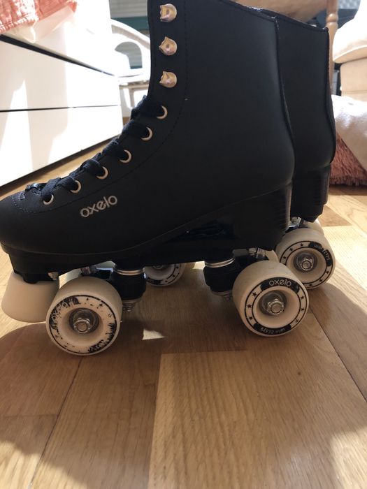 Patins 4 rodas. Usados 2x. Novos! N. 35