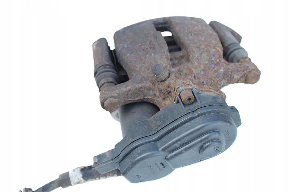AUDI A4 B8 LIFT 3.0 TDI QUATTRO ZACISK HAMULCOWY LEWY TYŁ ELEKTRYCZNY