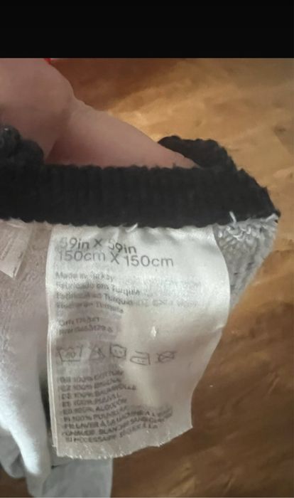 Okrągły ręcznik plażowy H&M Home 150 cm boho czarno biały wzór frędzle