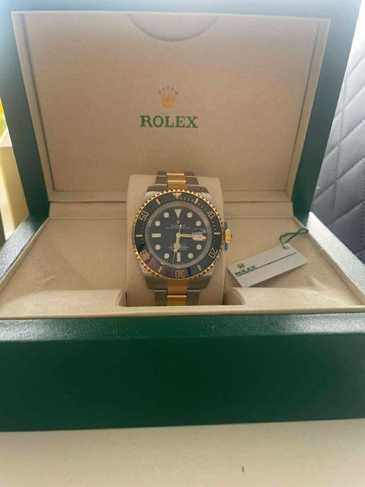 Zegarek Rolex czarno-złoty, stan doskonały