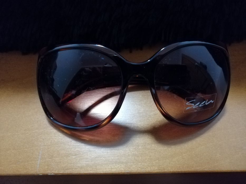 Óculos sol castanhos tartaruga
