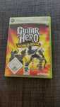 Pudełko i książeczka Guitar Hero World Tour Xbox 360