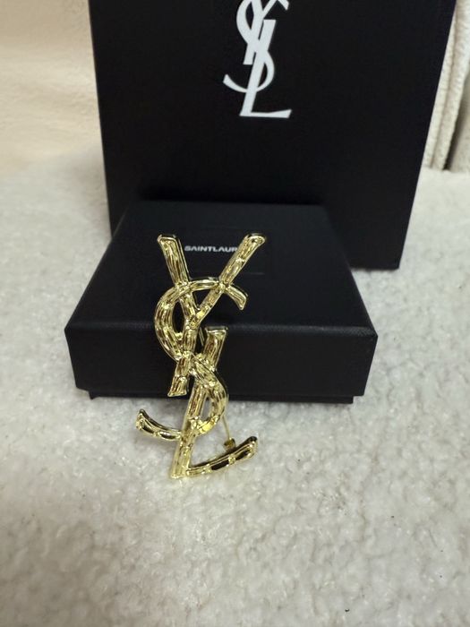 Broszka YSL duża z pelnym opakowaniem logowana