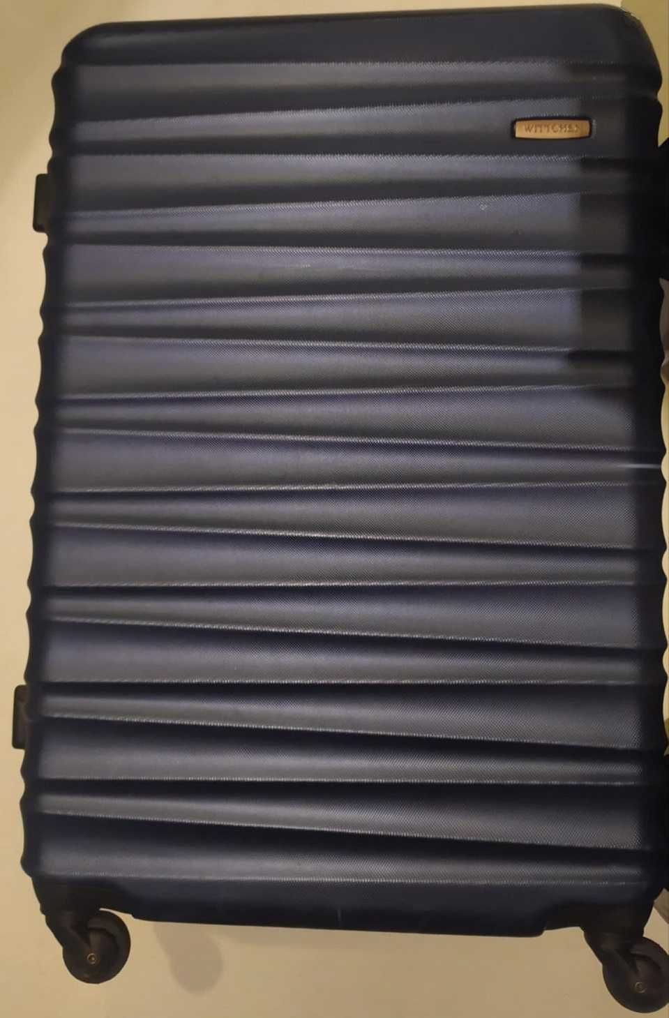 Duża walizka z ABS-u z żebrowaniem Granatowa GROOVE Line 96 L
