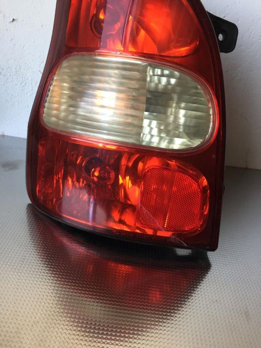 Farolim esquerdo KIA Carnival II (GQ)