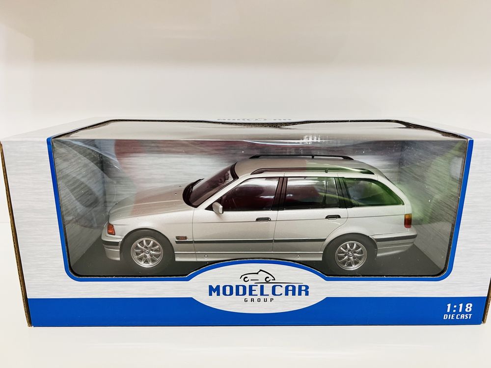 BMW 325 Touring E36 srebrny MCG 1/18