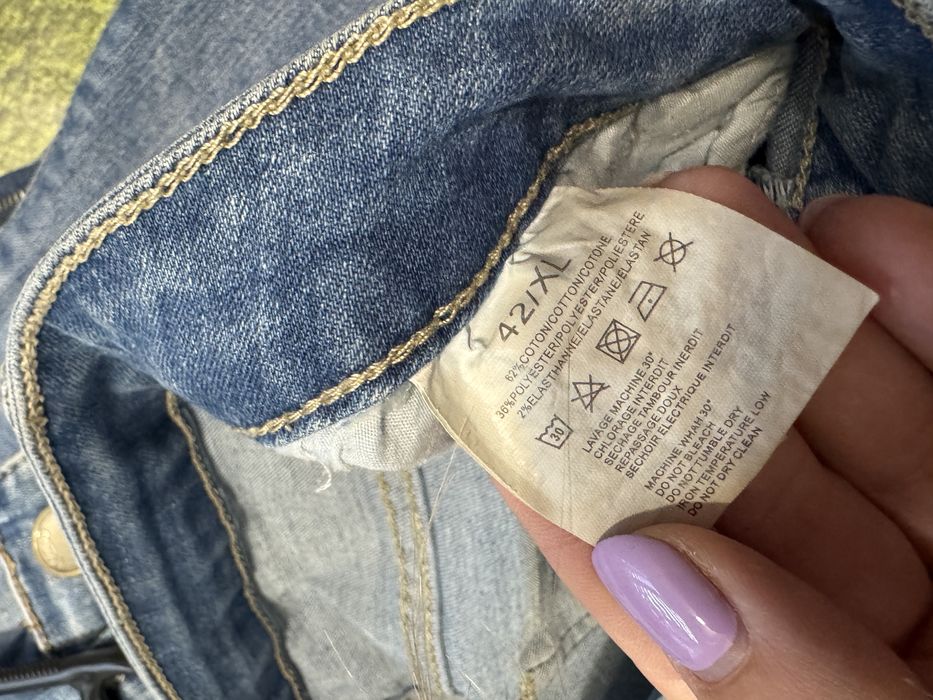 Jeansy damskie z rozdarciami rozmiar L