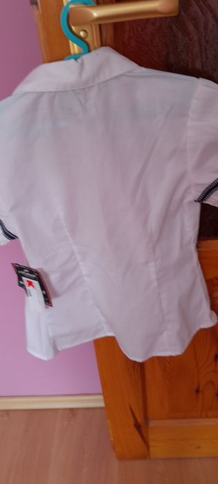Nowa z metką biała bluzka 134