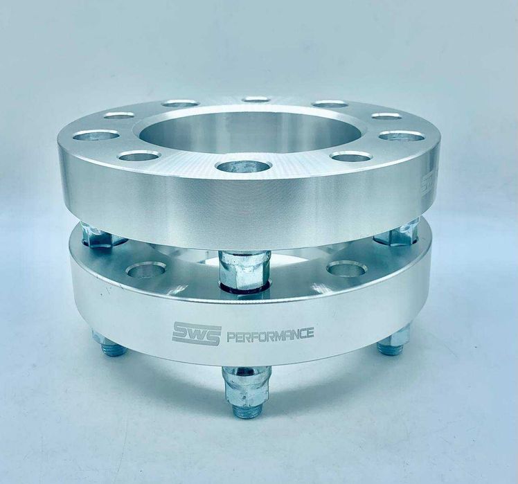 Проставки для расширения. решение проблем с вылетом. вибрацией руля.