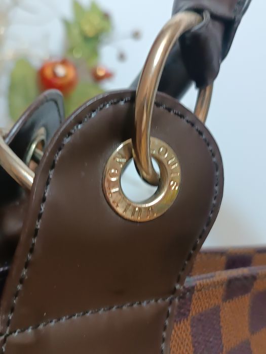 Брендова сумка Louise Vuitton.