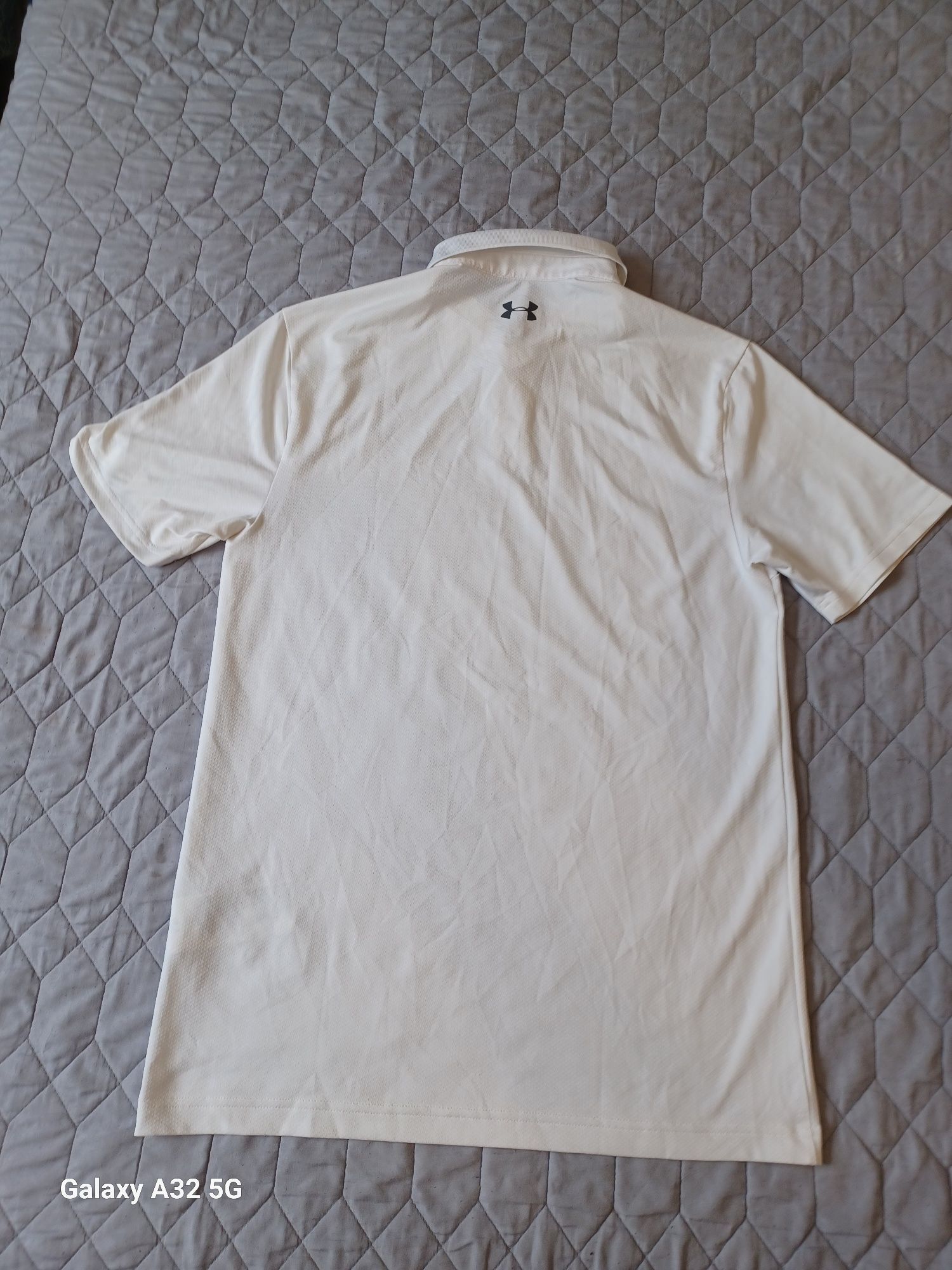 Koszulka polo Under Armour.